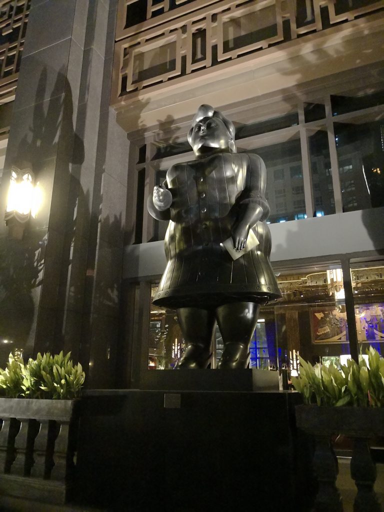 statues art gallery parkview square singapore night time